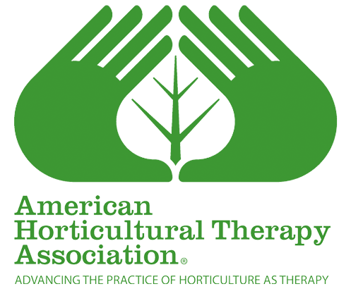American Horticultural Therapy Association logo. A pair of meeting green hands forming a leaf shape in the center